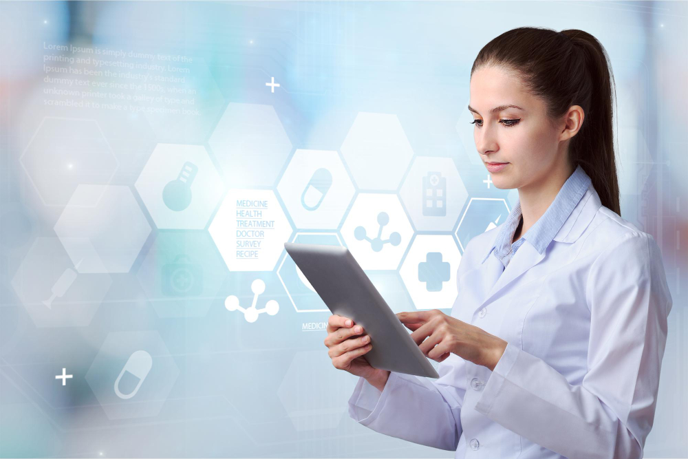 physician using digital tablet in order to see interoperable technology