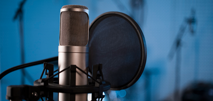 Close-up microphone and pop filter in podcasts for healthcare professionals